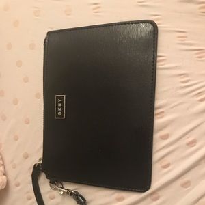 DKNY BLACK WRISTLET WITH SILVER HARDWARE.
